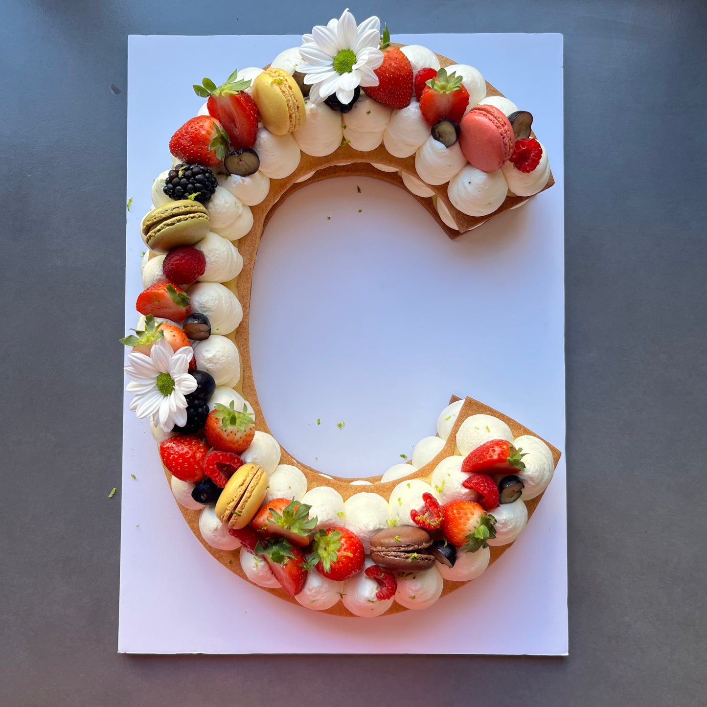 Letter lemon and fruits