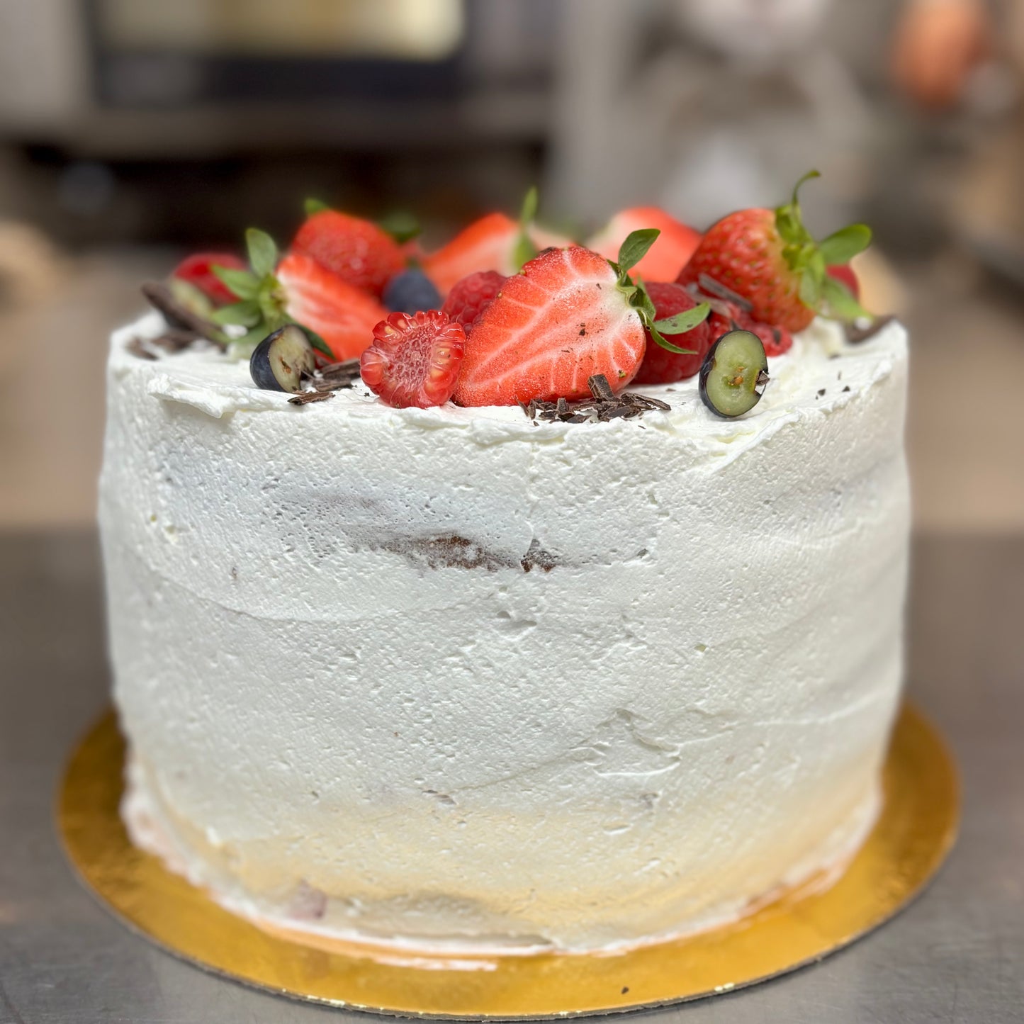 Sponge cake, cream, and strawberries